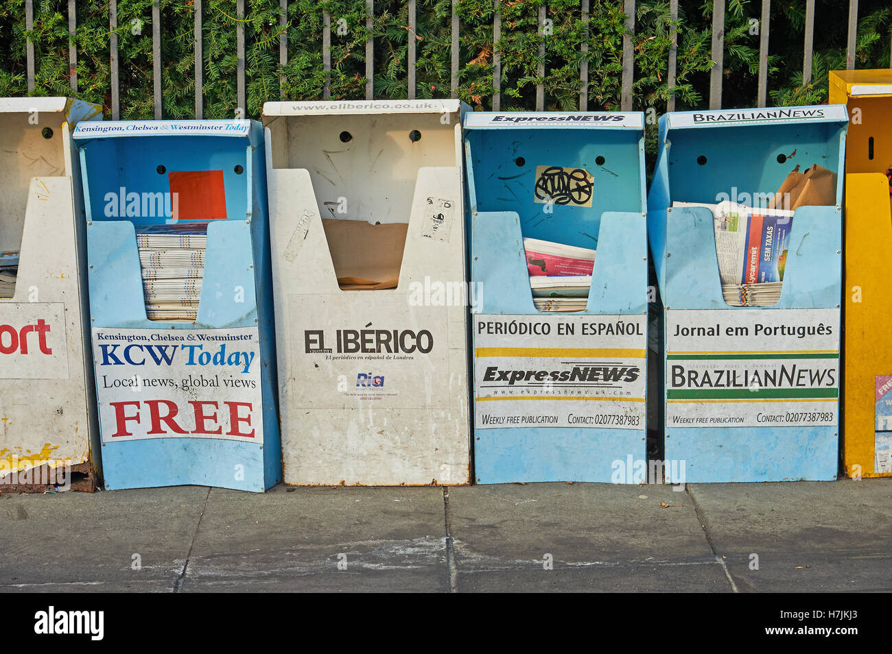 Free newspaper bins in a street in London Stock Photo Alamy