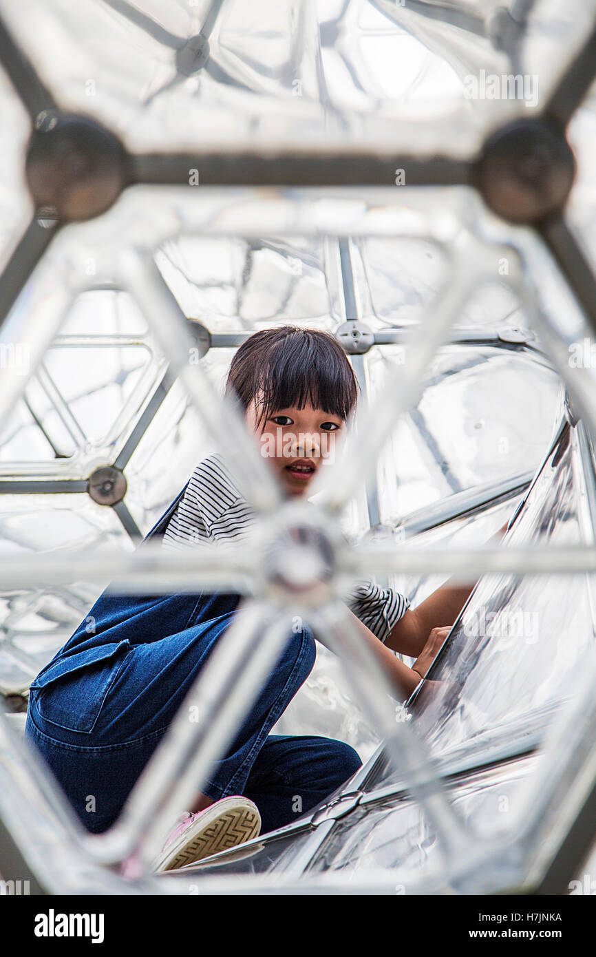 Unidentified boy at Hakone open air museum in Japan. Stock Photo