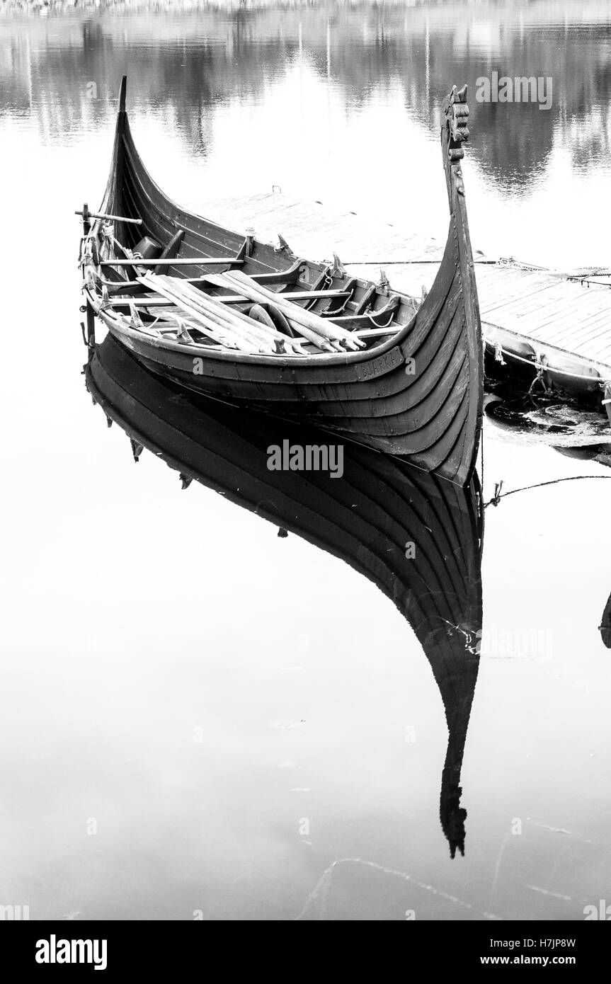 Old fishing boat moored Black and White Stock Photos & Images - Alamy