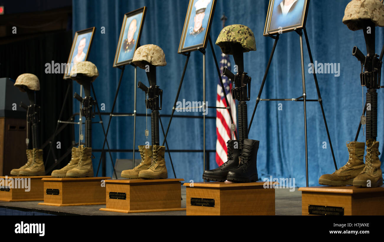 Battle crosses mounted on stage represent fallen service members at Chattanooga McKenzie Arena August 15, 2015 in Chattanooga, Tennessee. The soldiers were killed in a terror attack on several military recruitment centers in Chattanooga. Stock Photo