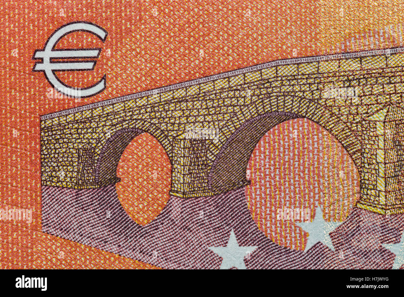Ten Euro banknote fragment with Euro symbol closeup, back side Stock Photo