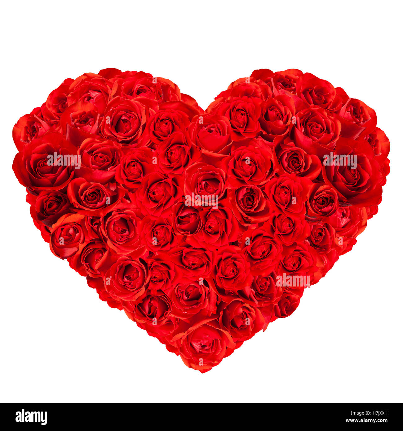 Red roses arranged into a heart shape for special occasions Stock Photo