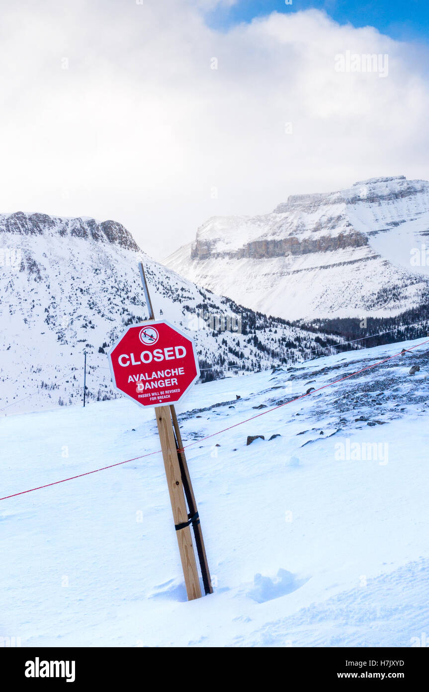An avalanche danger sign at Lake Louise Ski Resort in Alberta, Canada Stock Photo