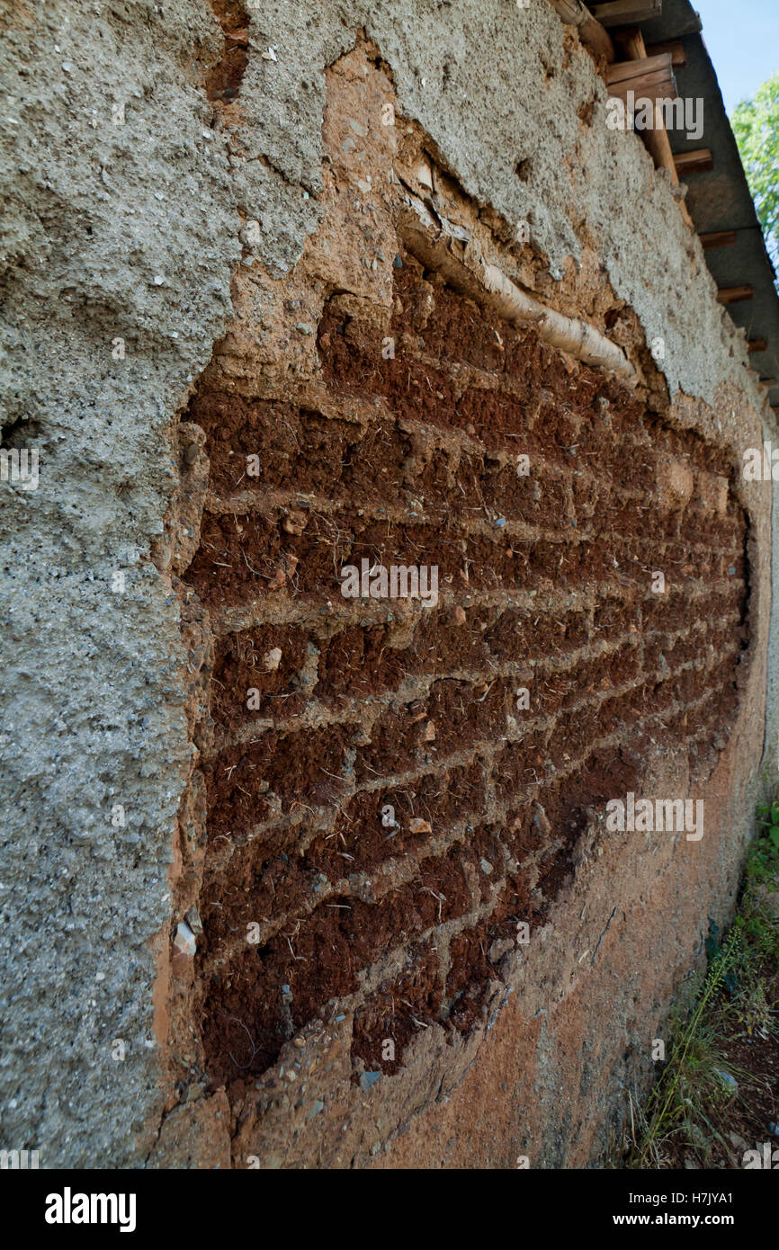 Wall of old adobe house closeup Stock Photo