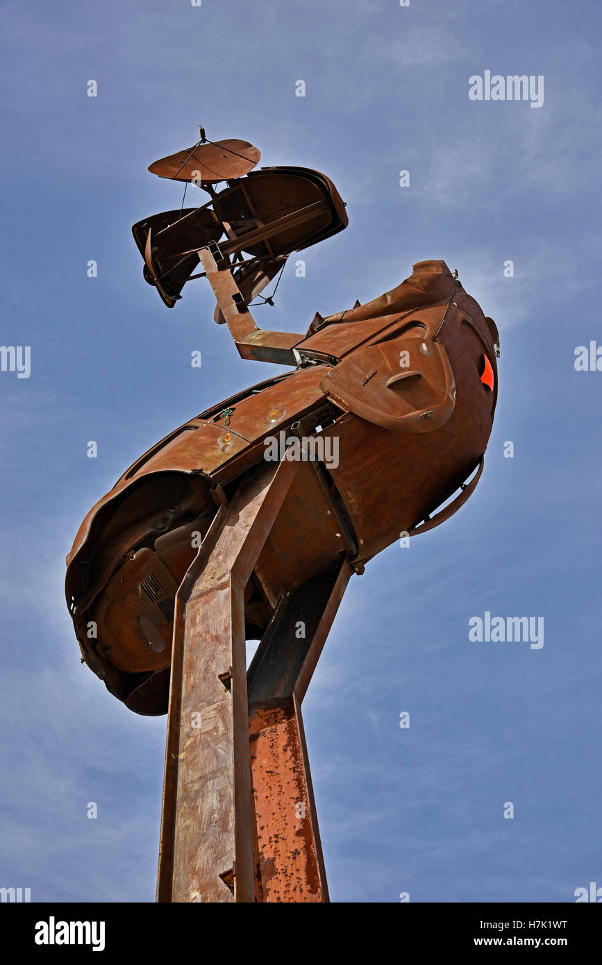 Stanley a sculpture by John Murray stands by the highway near lightning