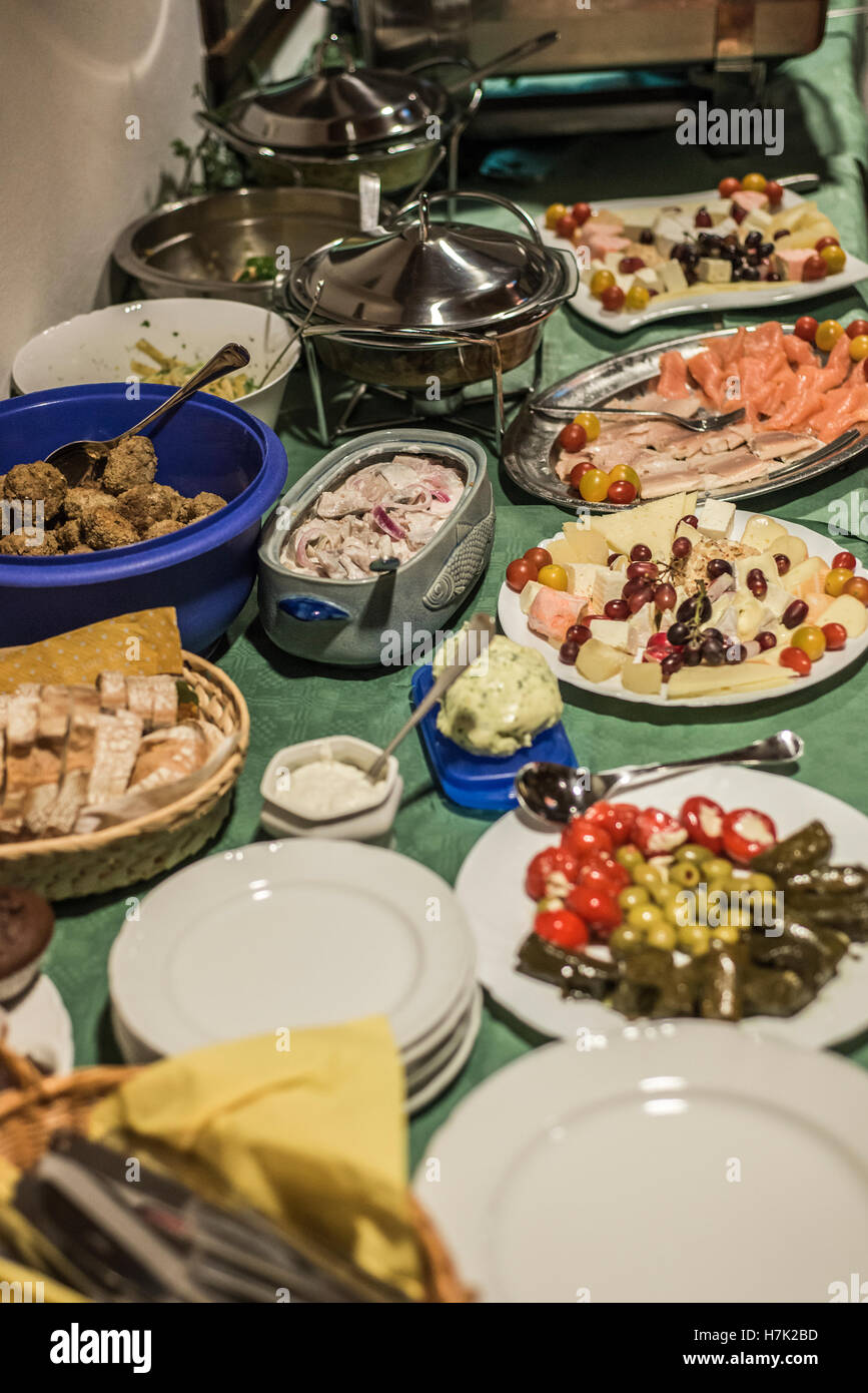 Party Brunch big Buffet table setting with Food Meat Vegetables Stock Photo  - Alamy