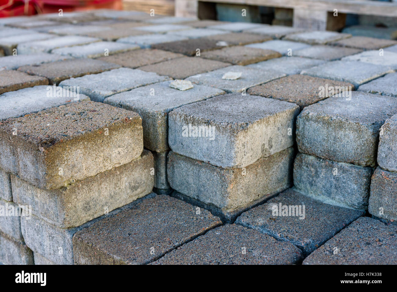 Stack of small rectangular concrete pavers. Stock Photo