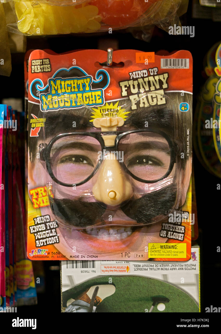 A funny face mask for sale at the Halloween Adventure costume shop in Greenwich Village, New York City. Stock Photo