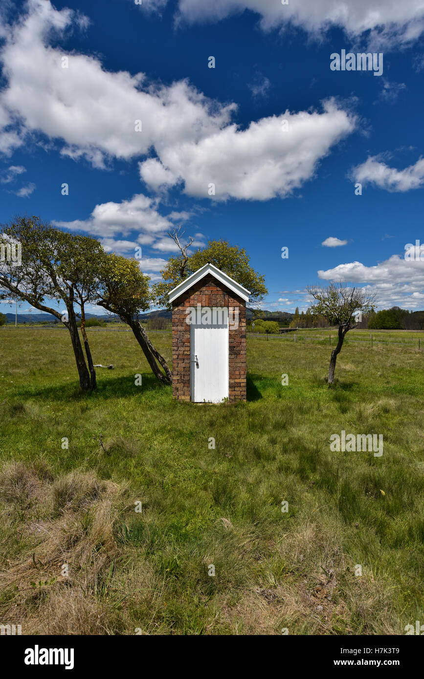 Australian brick outhouse toilet or dunny or thunderbox at small country rural town australian by Matheson Presbyterian Church Stock Photo