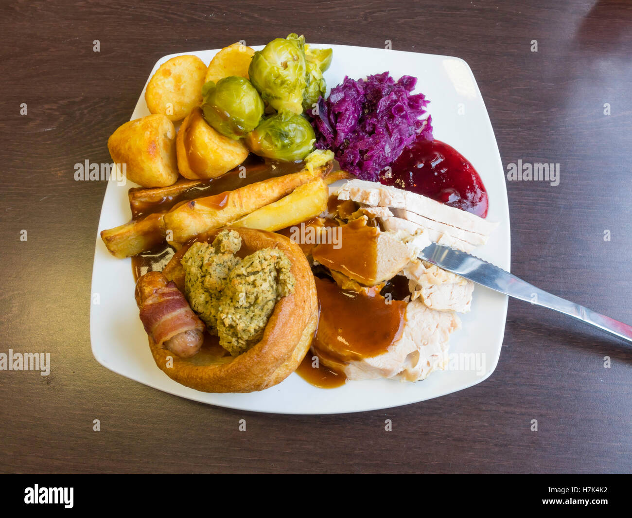 Sunday Lunch main course Roast Turkey Yorkshire pudding Sausage Bacon