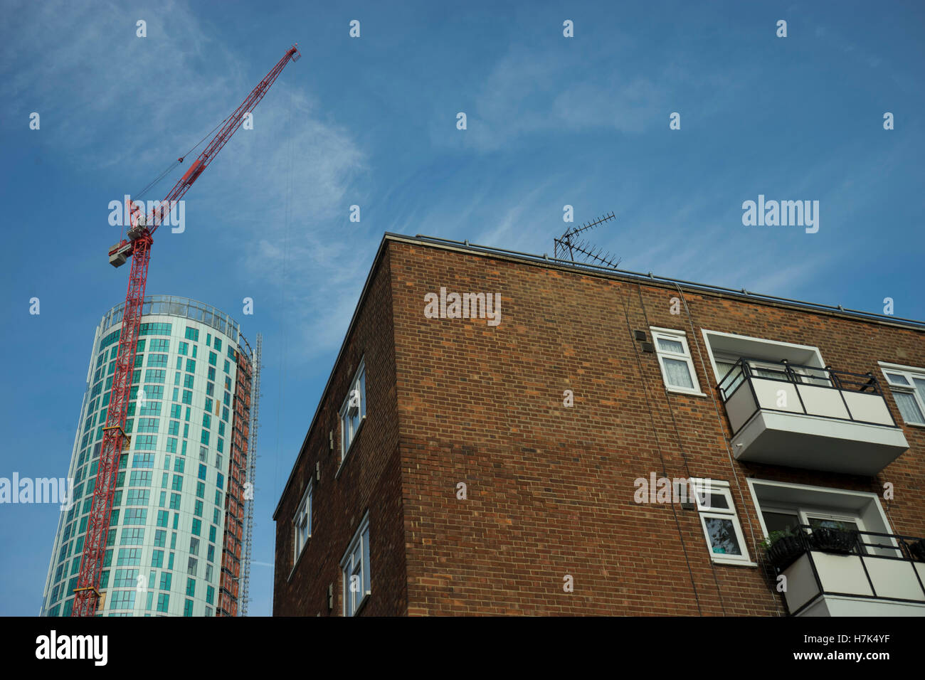 New building development construction by old council houses near the ...