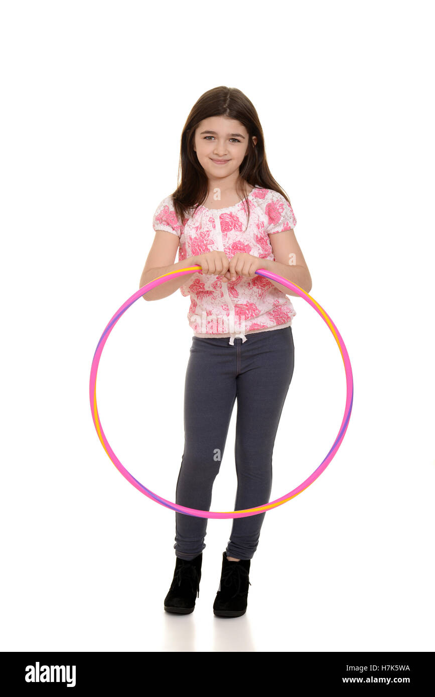 little girl holding hula hoop Stock Photo Alamy