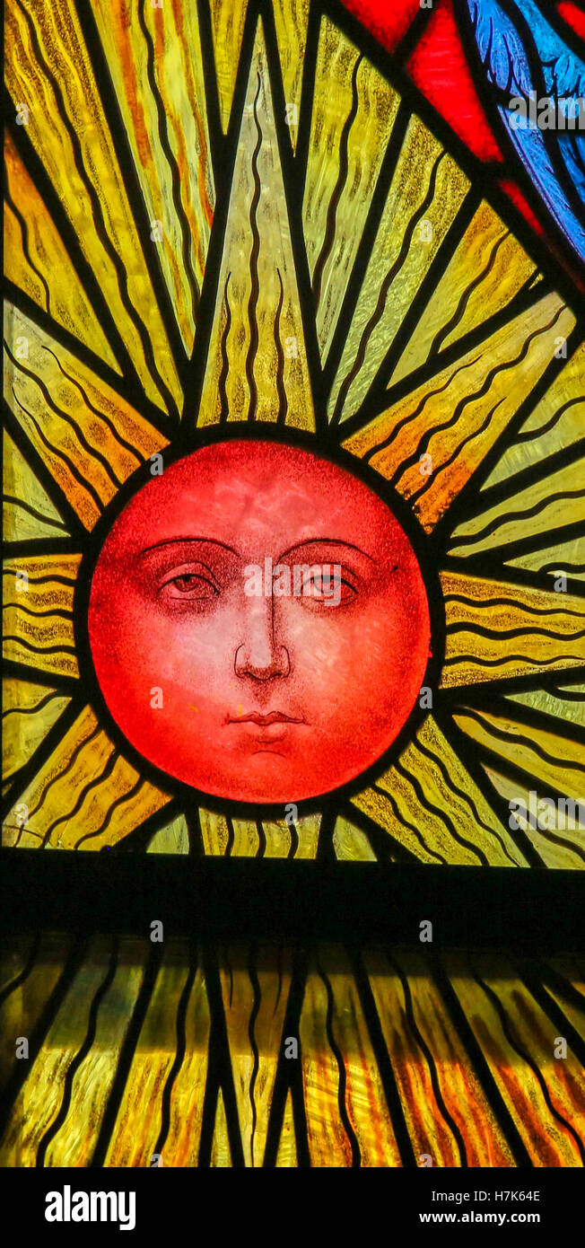 Stained Glass window depicting a Sun, in the Cathedral of Saint Rumbold in Mechelen, Belgium. Stock Photo