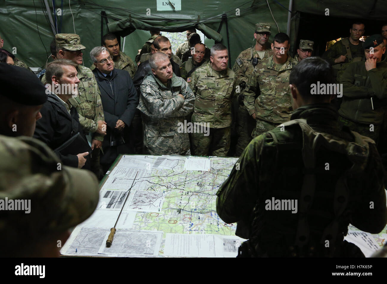 NATO Alliance senior leaders conduct a mission brief while managing a tactical operations center during exercise Allied Spirit V at the Hohenfels Training Area October 11, 2016 in Hohenfels, Germany. Stock Photo