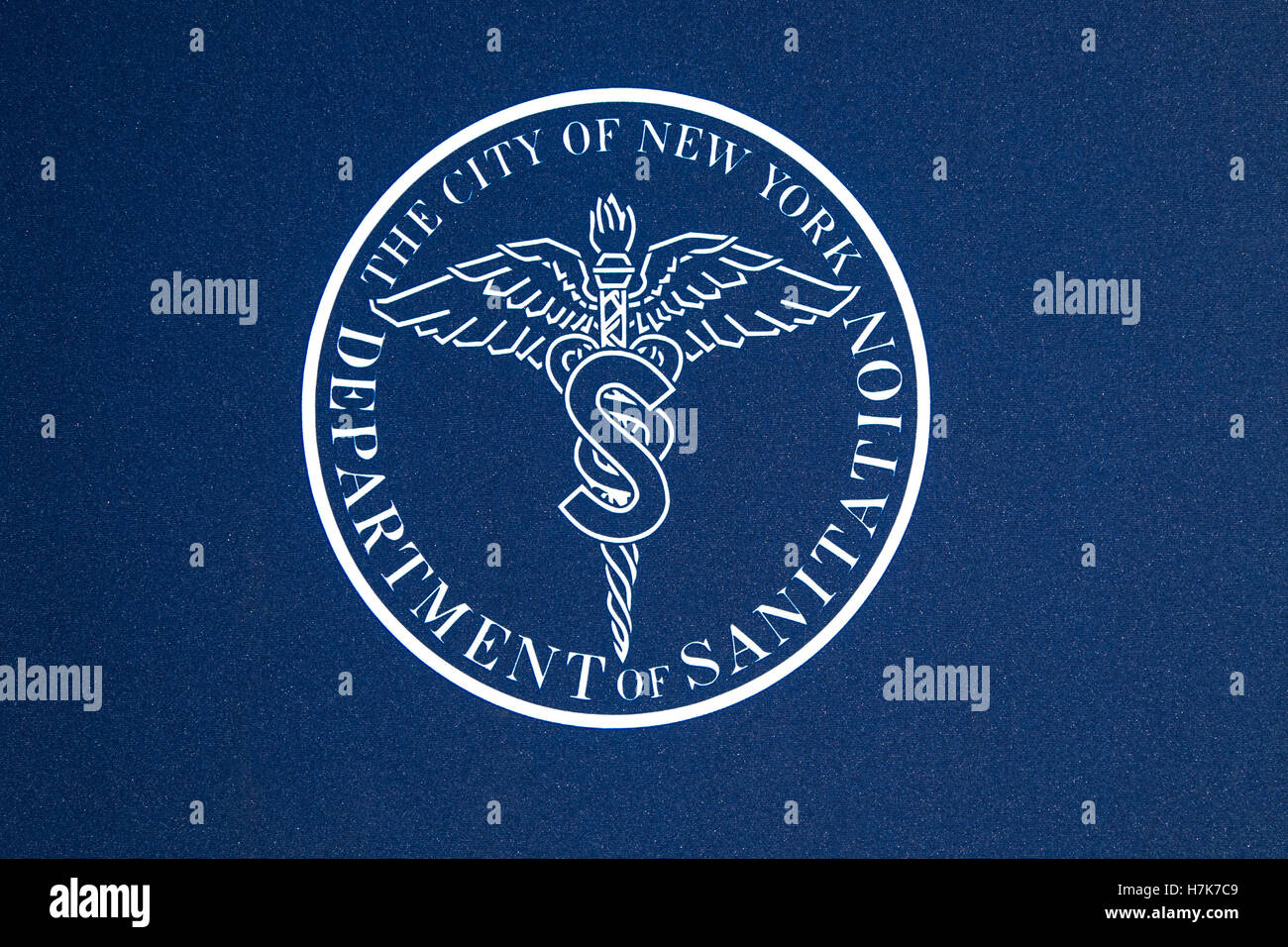 New York City Department of Sanitation logo, white on dark blue. Stock Photo