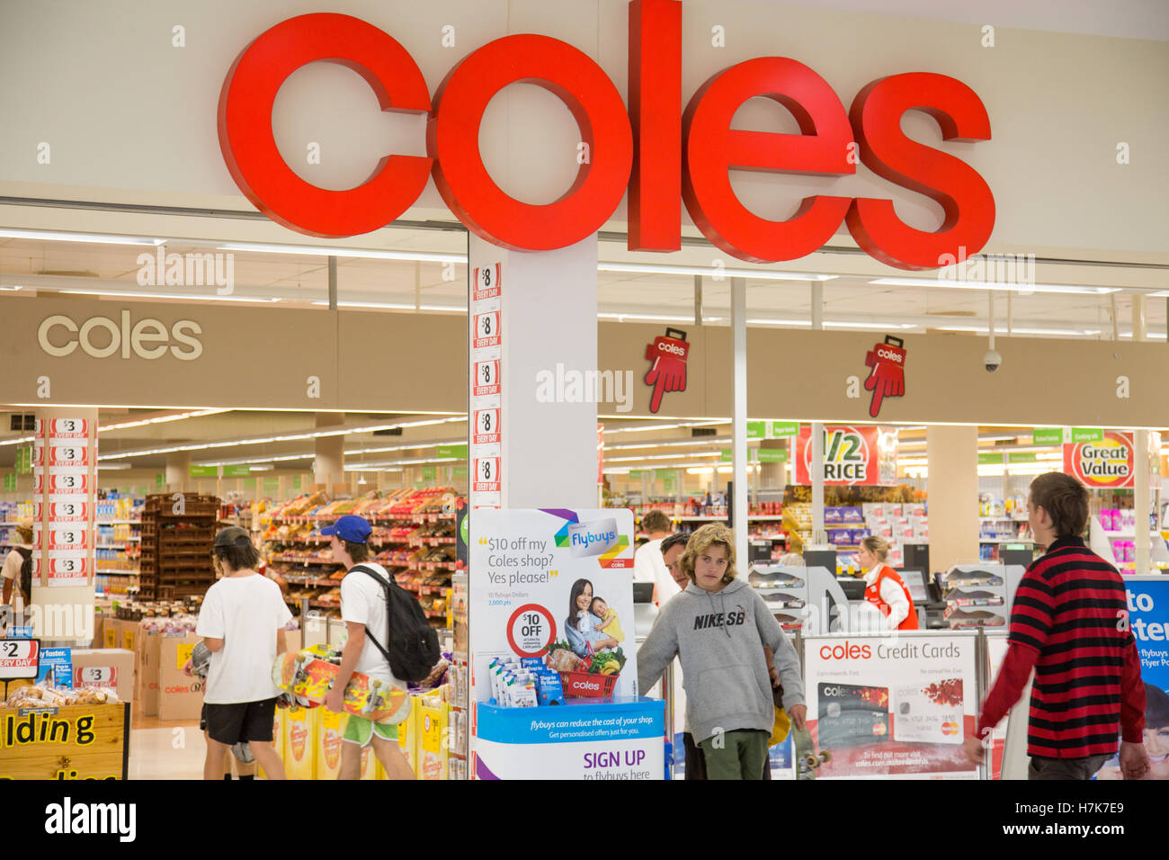 Entrance to Coles supermarket store in Warriewood Sydney,Australia with young boys teenagers shopping Stock Photo