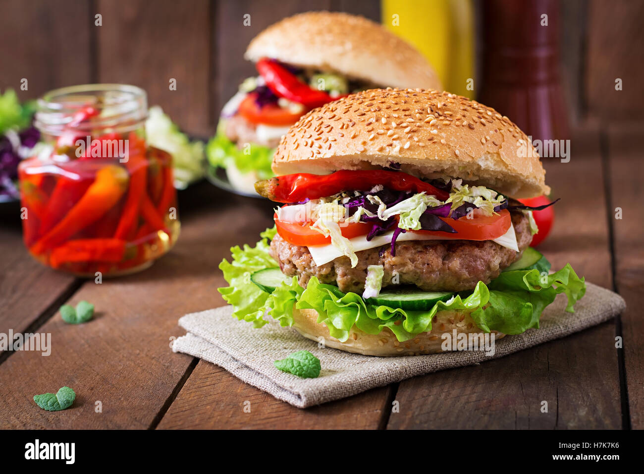 Sandwich hamburger with juicy burgers, cheese and mix of cabbage Stock  Photo - Alamy