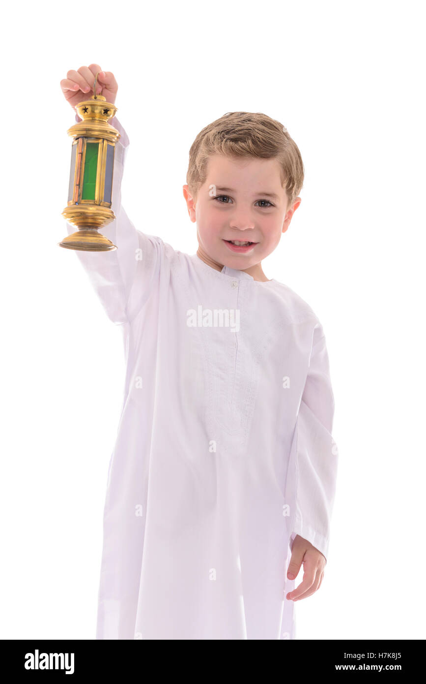 Happy Young Muslim Boy With Ramadan Fanoos Isolated on White Background Stock Photo