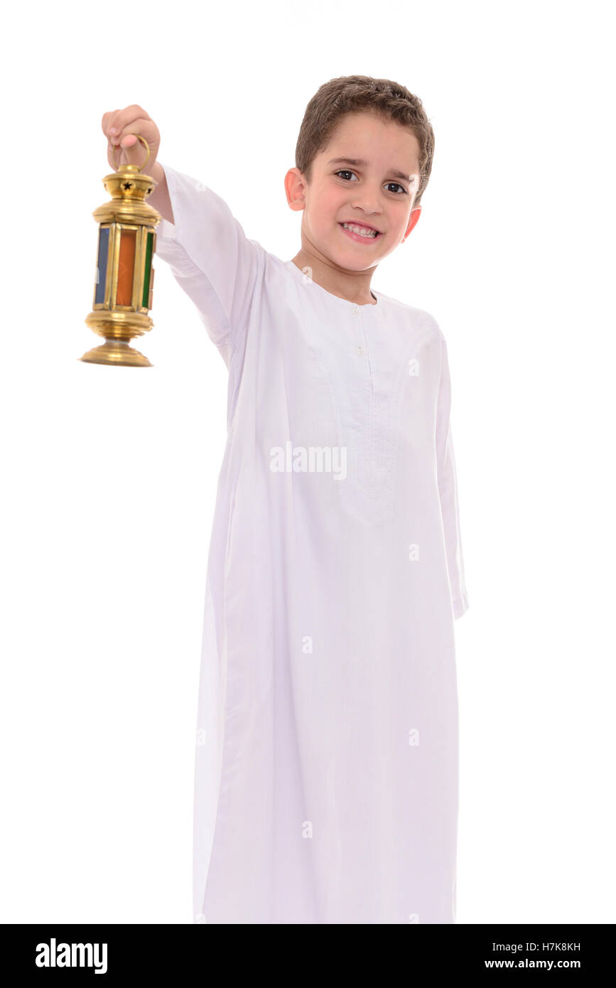 Happy Boy In White Djellaba Celebrating Ramadan Isolated on White Background Stock Photo