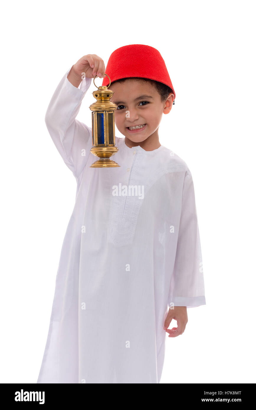 Happy Young Boy Holding Fanoos Celebrating Ramadan Isolated on White Background Stock Photo