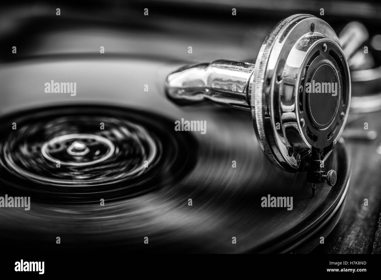 Gramophone playing old disk, old days music, in Black and White, close up shot Stock Photo