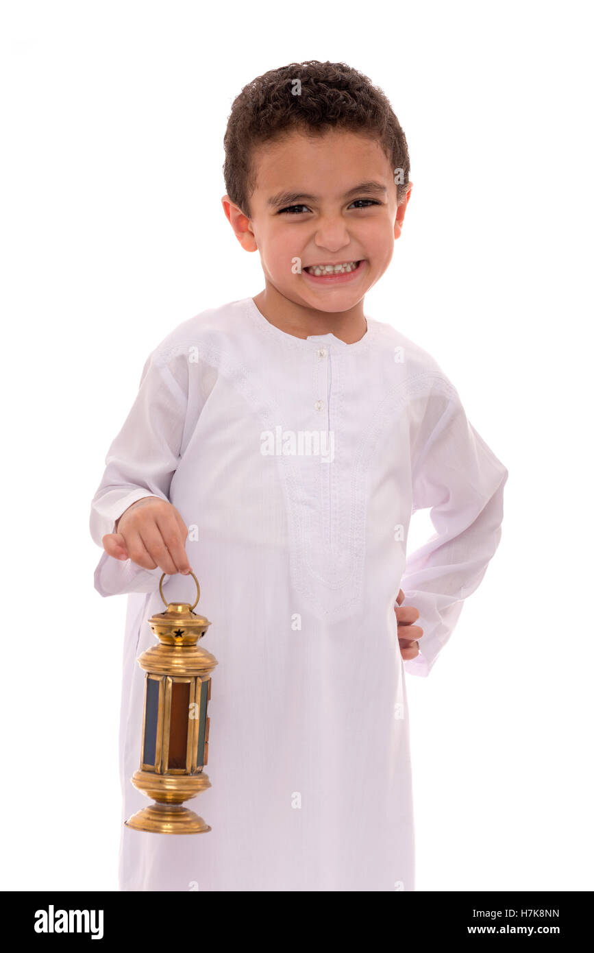 Happy Young Boy with Fanoos Celebrating Ramadan Isolated on White Background Stock Photo