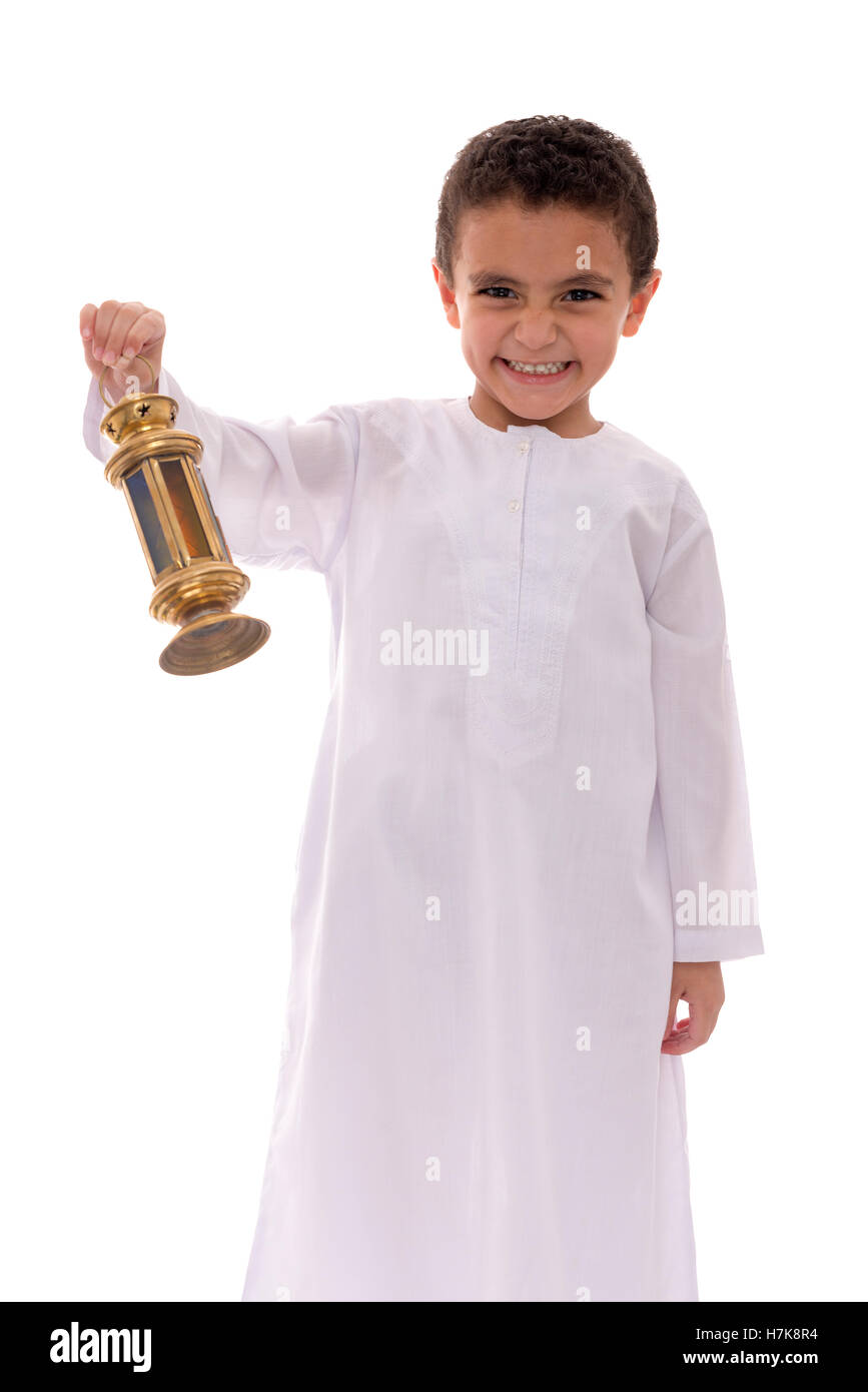 Happy Young Boy Celebrating Ramadan with Fanoos Isolated on White Background Stock Photo