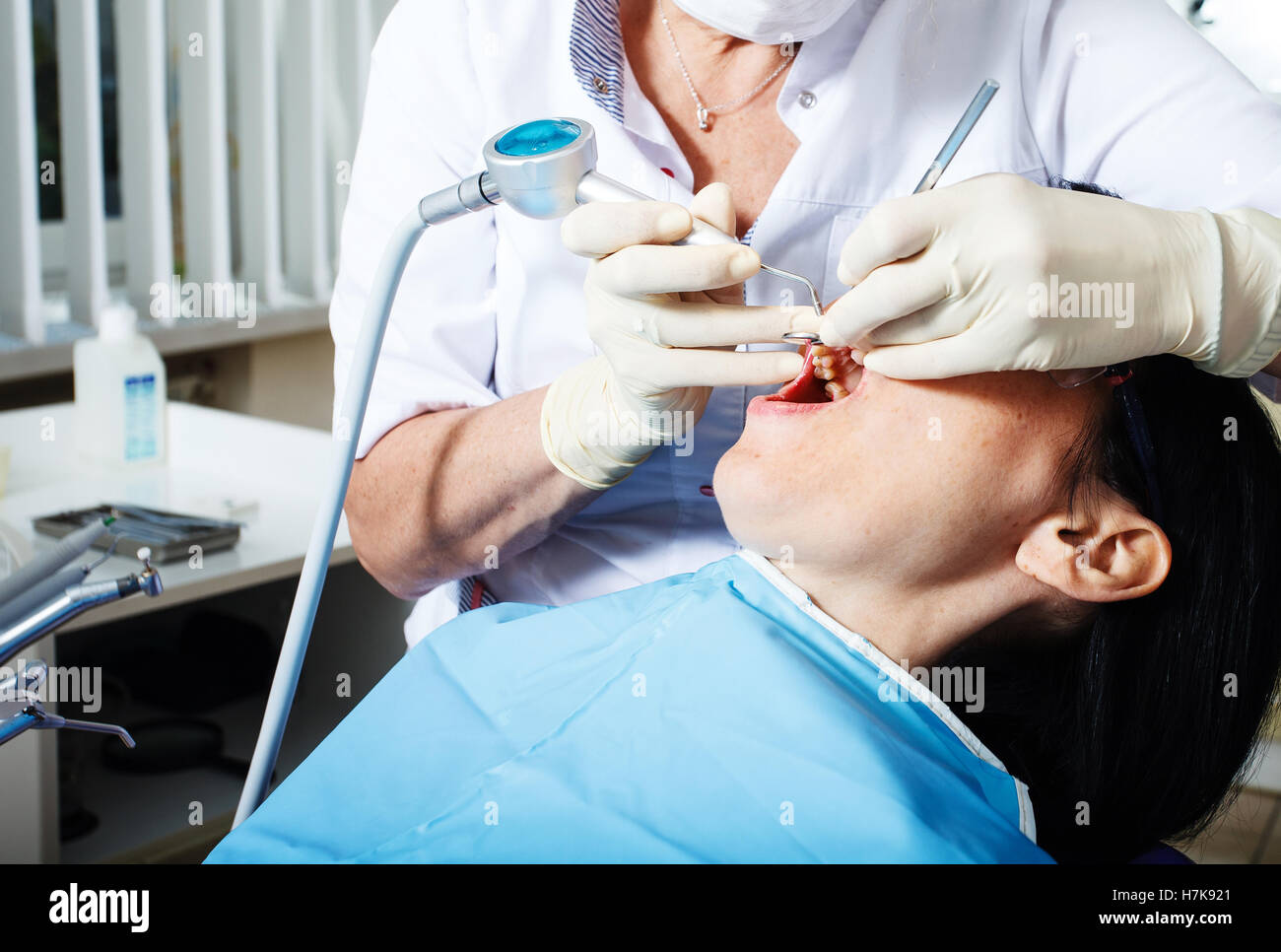 a dentistry, patient examination and treatment at the dentist Stock