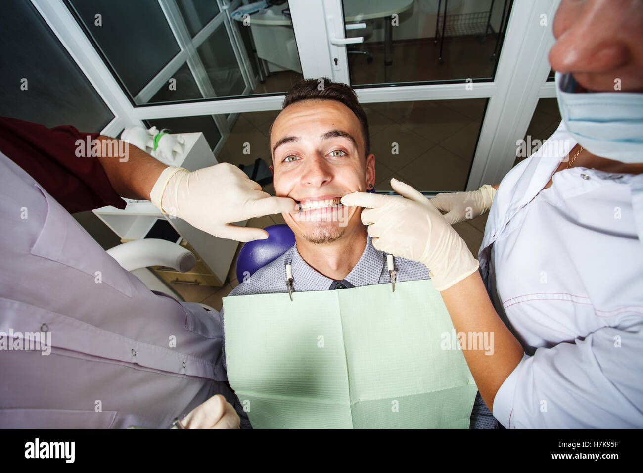 a dentistry, patient examination and treatment at the dentist Stock