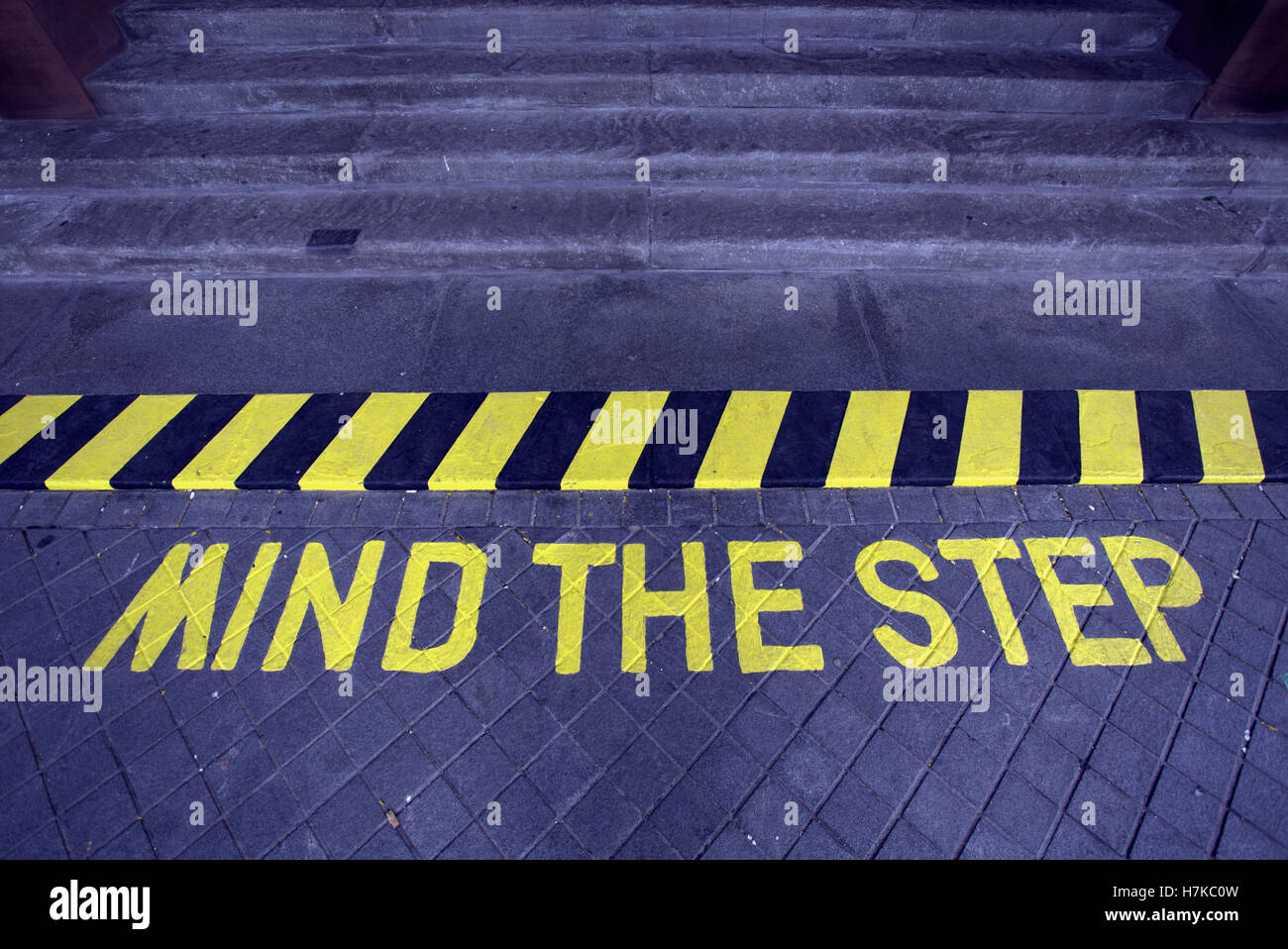 mind the step hazard warning sign Stock Photo