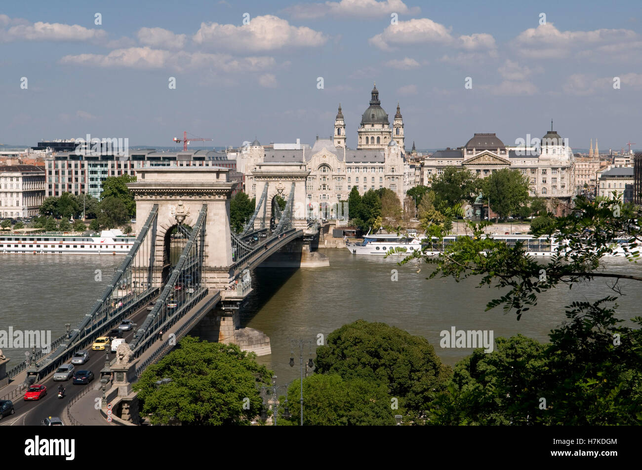 View from the Castle Hill on the banks of the Danube river with the Chain Bridge, Gresham Palace and St. Stephen's Basilica Stock Photo