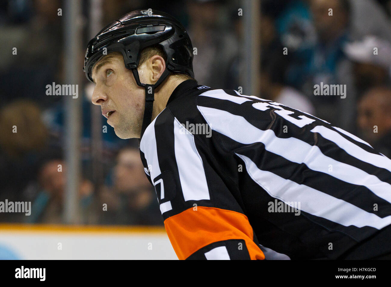 Sidney Crosby of Team Canada talks with referee Wes McCauley