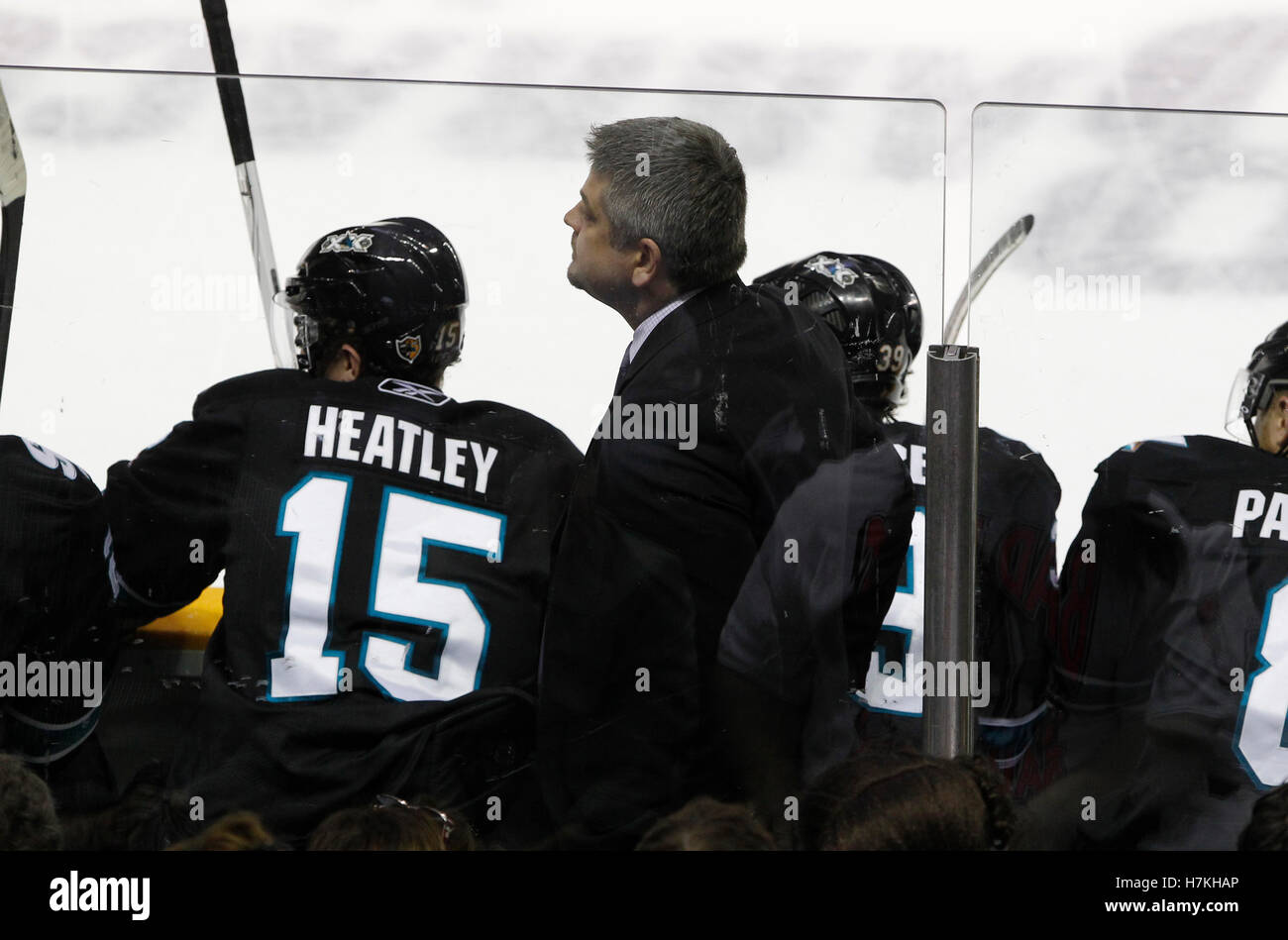 May 20, 2011; San Jose, CA, USA; San Jose Sharks head coach Todd McLellan (top) watches behind the bench during the first period of game three of the western conference finals of the 2011 Stanley Cup playoffs against the Vancouver Canucks at HP Pavilion. Stock Photo