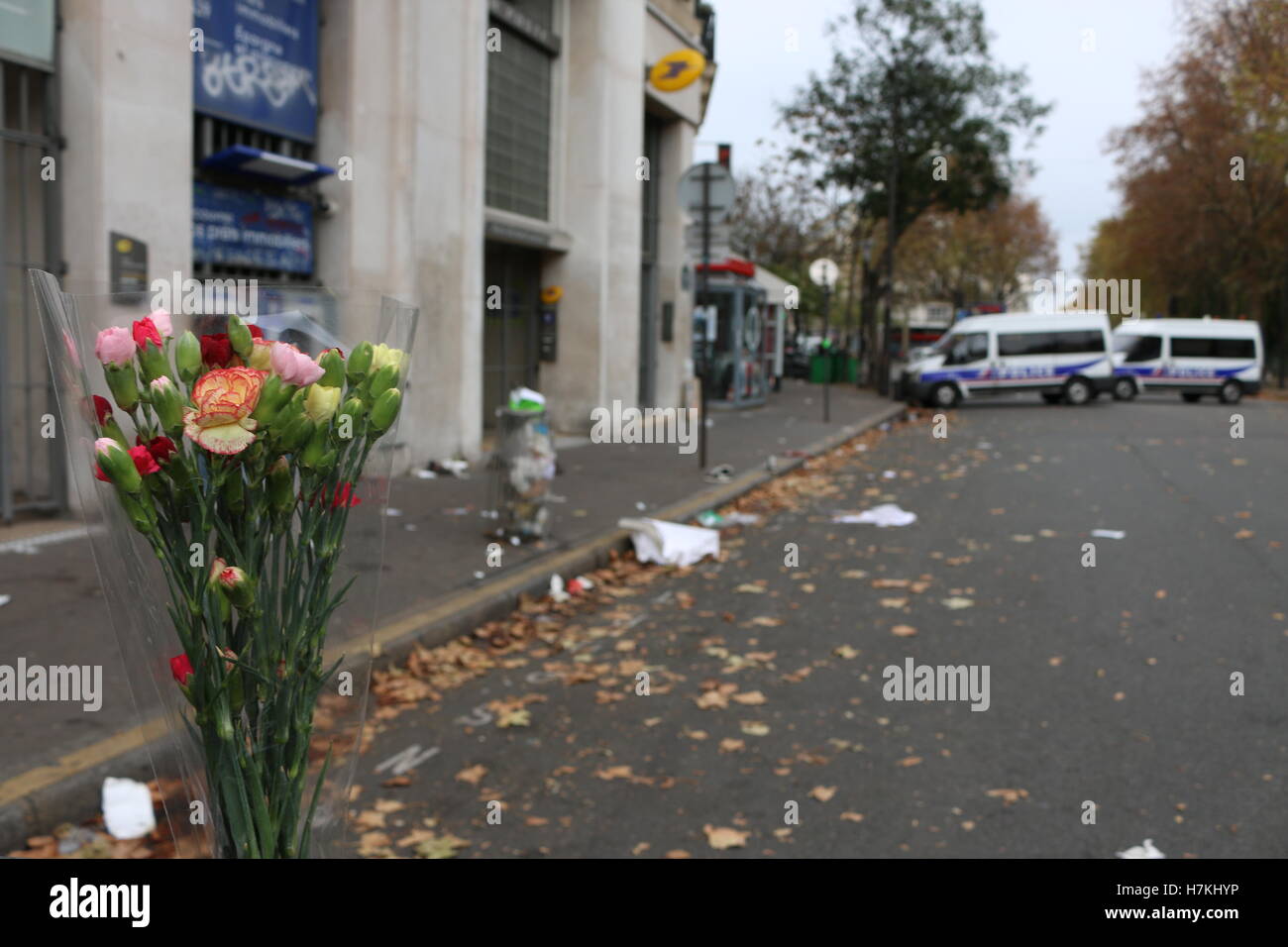 Flowers left at the scene of the Bataclan masscre in Paris Stock Photo
