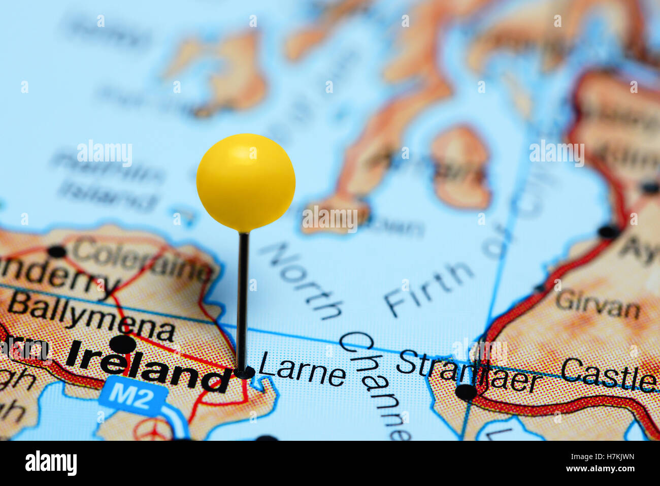 Larne pinned on a map of Northern Ireland Stock Photo