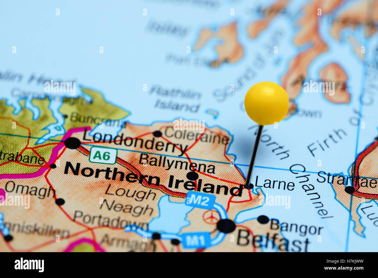 Larne pinned on a map of Northern Ireland Stock Photo
