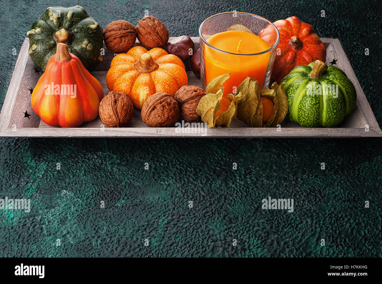 Tray with autumn harvest on textural background with copy space Stock Photo