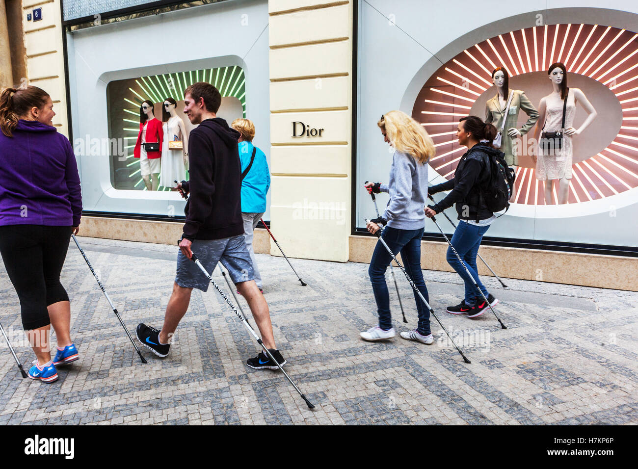 alias Picasso Universeel Young people doing Nordic walking in the Parizska street, passing by Dior  luxury shop, Old Town, Czech Republic Stock Photo - Alamy