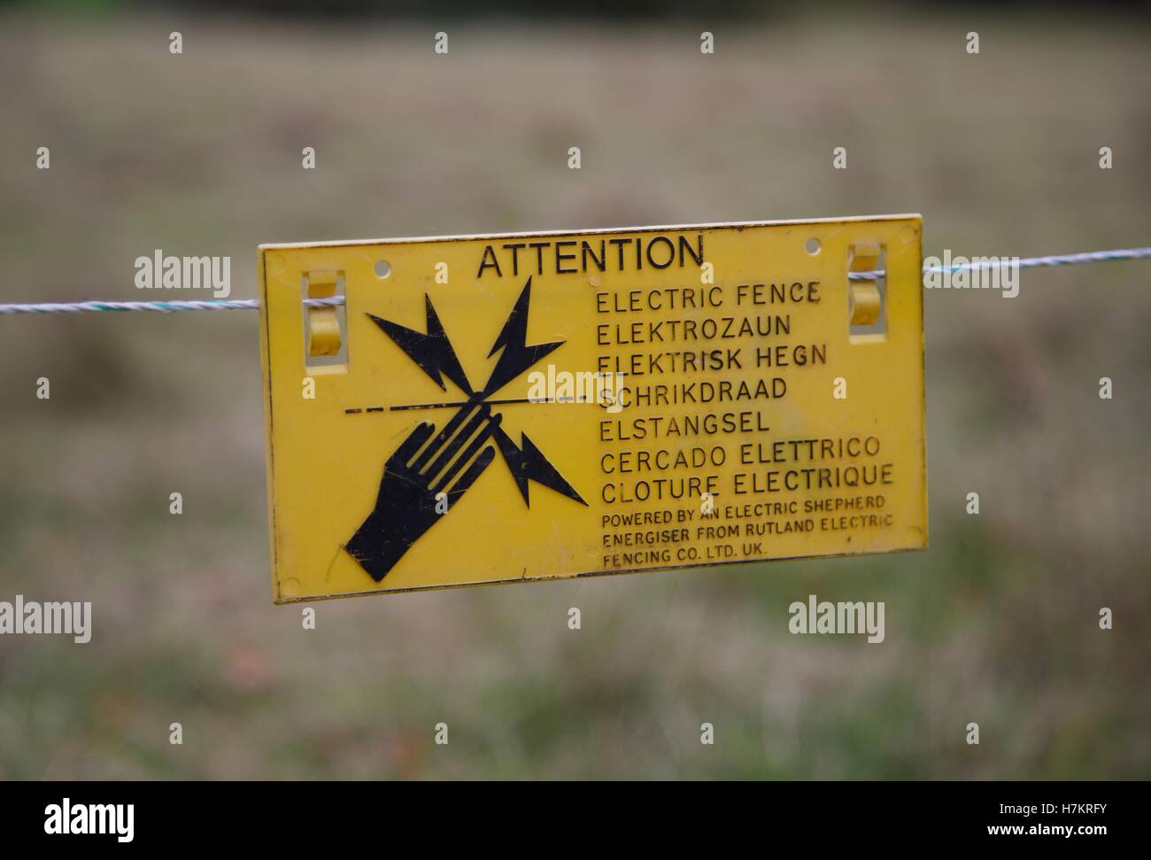 Electric fence warning sign Stock Photo Alamy