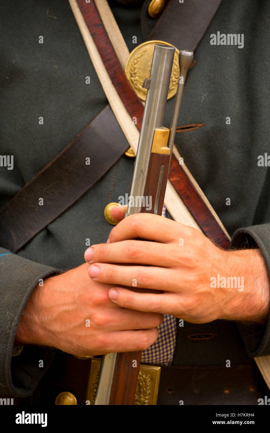 Confederate rifle with hands, Civil War Reenactment, Willamette Mission