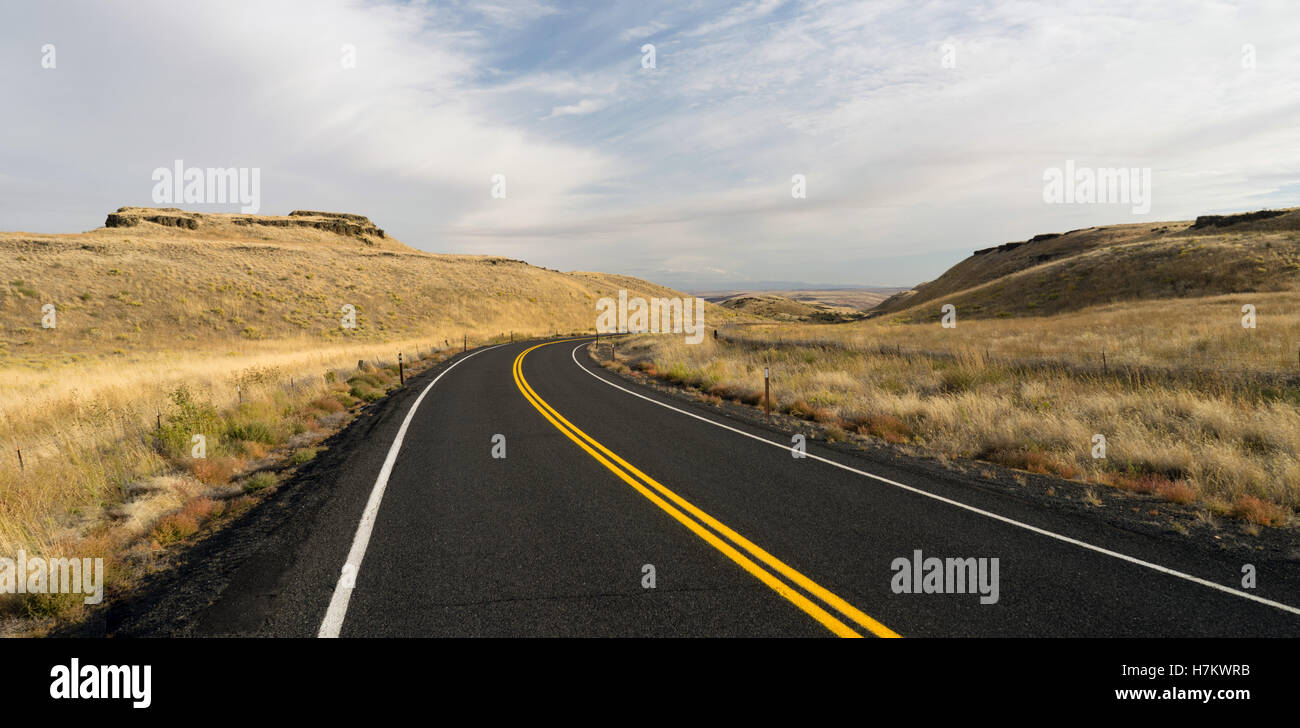 Two Lane blacktop road leads through scenic Oregon State Stock Photo ...