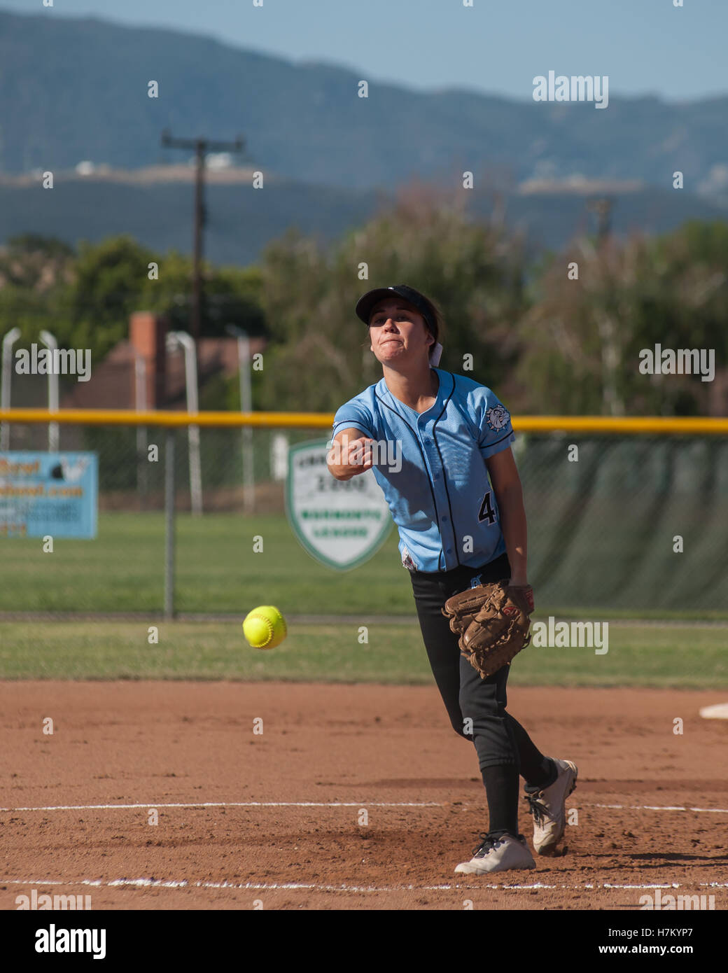 High school softball player in game action Stock Photo Alamy