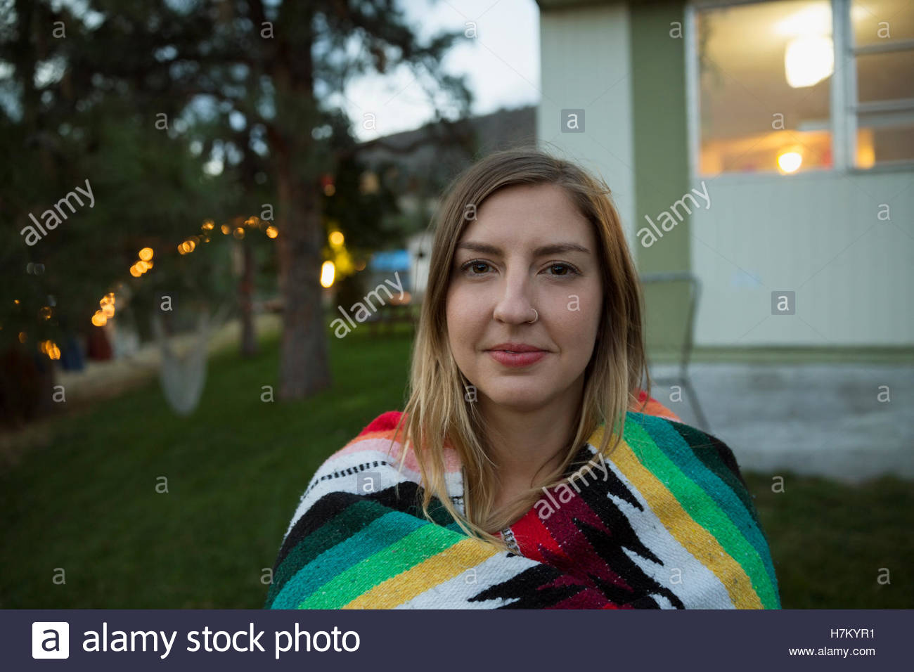 Portrait woman wrapped in a blanket outdoors Stock Photo Alamy