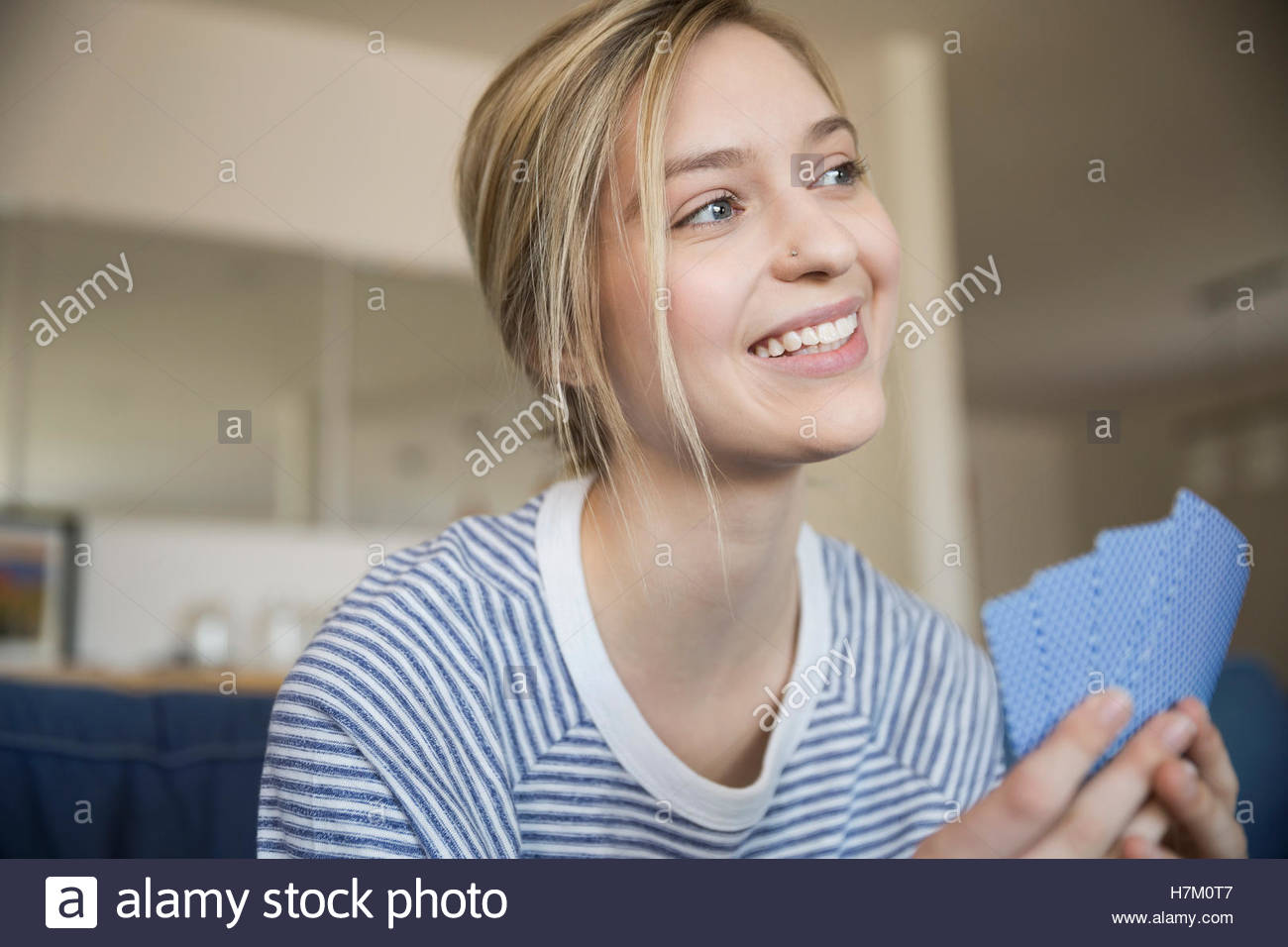 Close up young woman playing cards Stock Photo