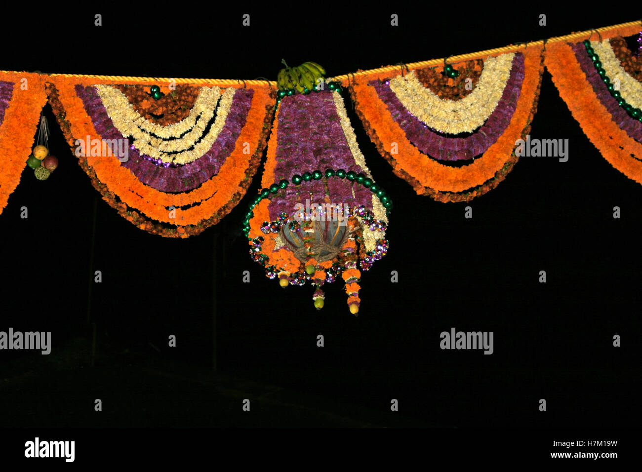 Garlands and the hanging pot. This is called as 'Dahi Handi' a Hindus  festival during July to celebrate the birthday of Lord Kri Stock Photo -  Alamy