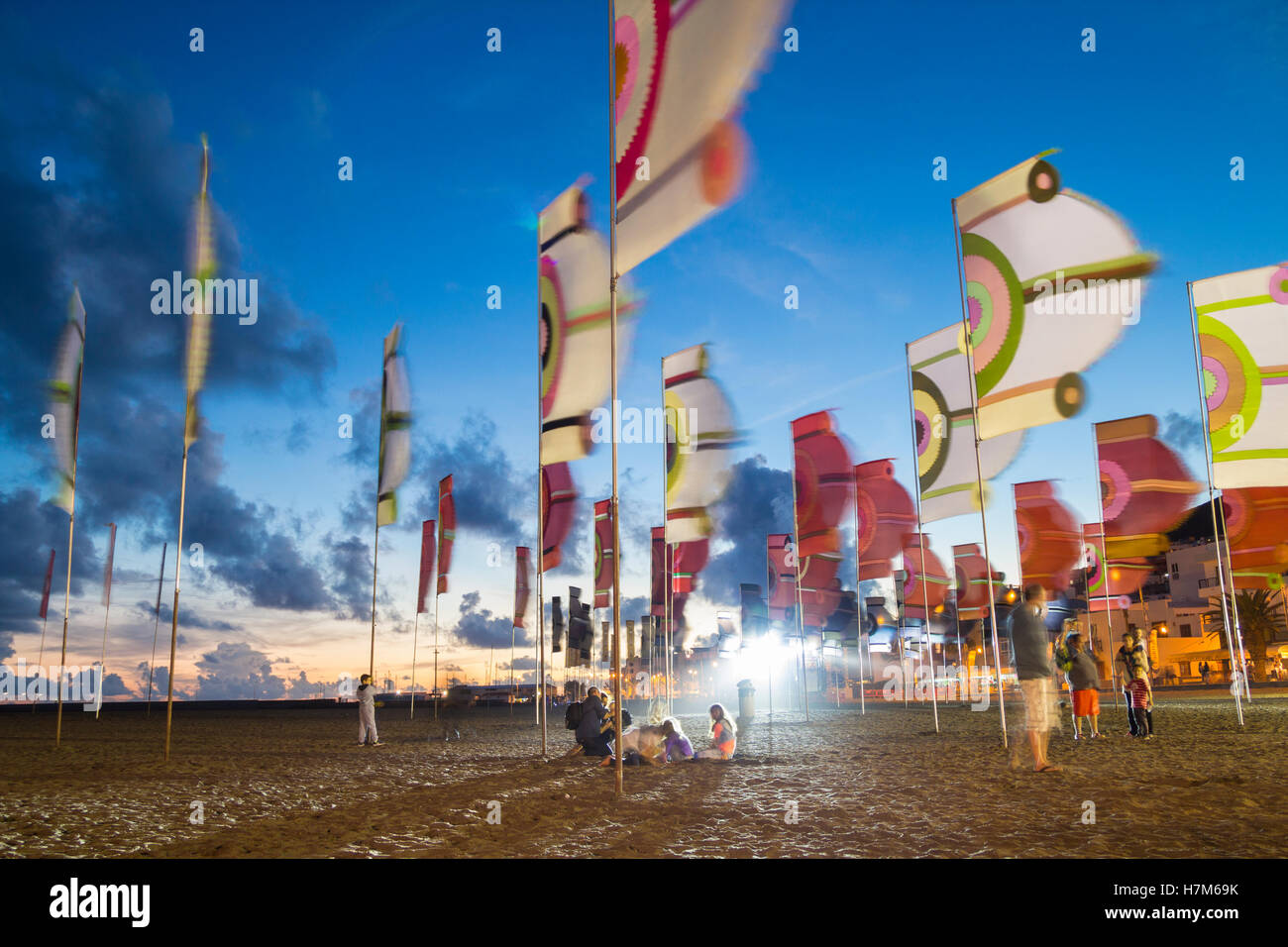 Gran Tarajal, Fuerteventura, Canary Islands, Spain. 5th November, 2016. Womad flags flying on the beach between stages at sunset at Womad music festival (4th-6th Nov) on the beach at Gran Tarajal on Fuerteventura. Credit:  Alan Dawson News/Alamy Live News Stock Photo