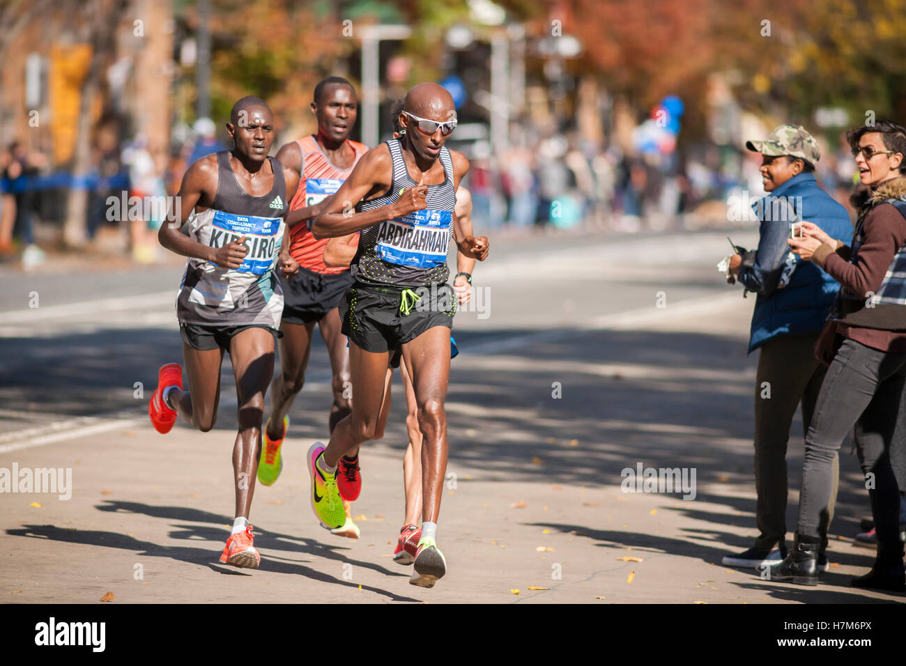 New York, USA. 06th Nov, 2016. Somali born American Abdi Abdirahman leads a pack of men as they pass through Harlem in New York near the 22 mile mark near Mount Morris Park on Sunday, November 6, 2016 in the 46th annual TCS New York City Marathon. Abdirahman finished third in the marathon at 2 hours 11 minutes 23 seconds. ( © Richard B. Levine) Credit:  Richard Levine/Alamy Live News Stock Photo