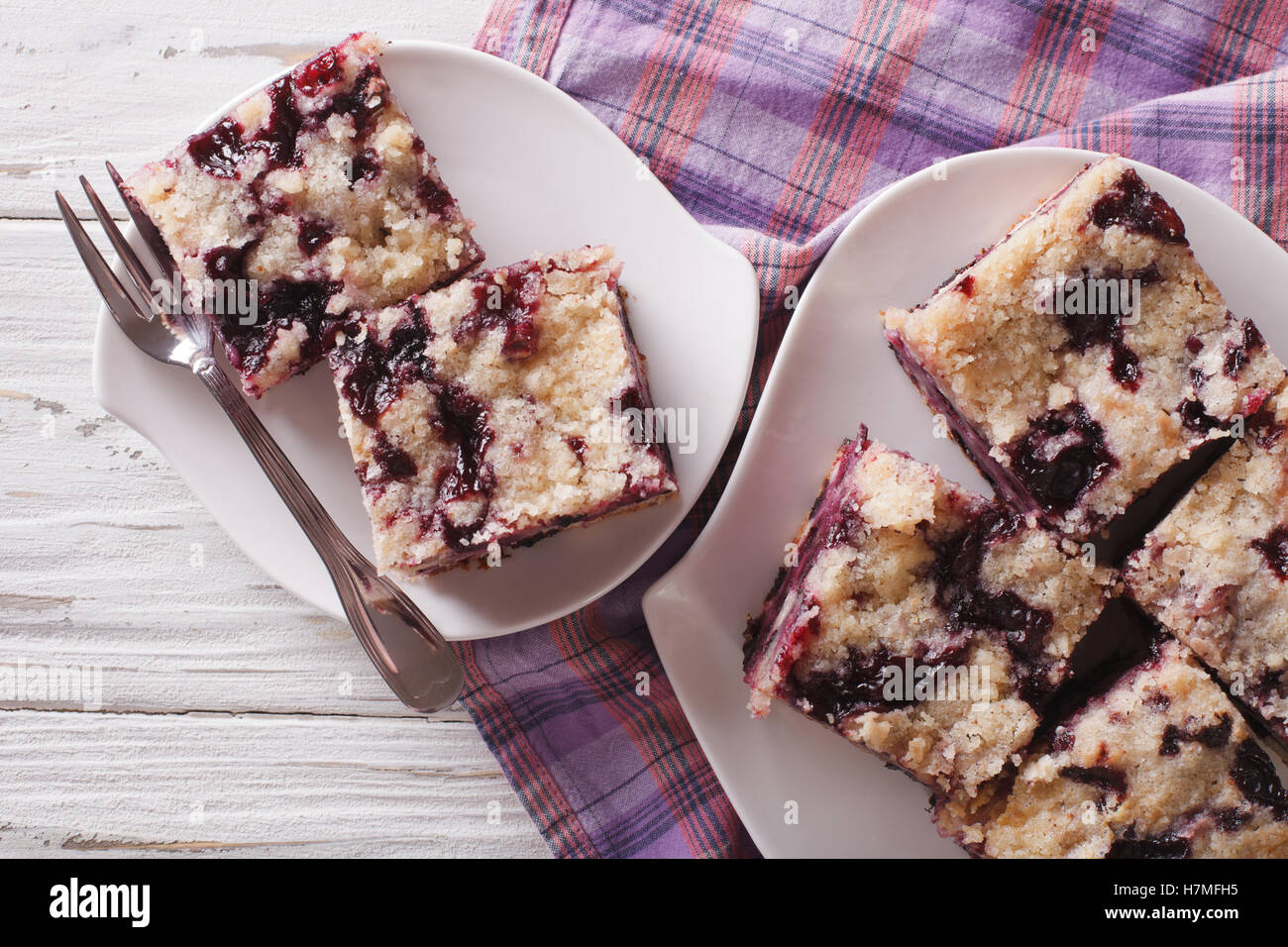 Berry Buckle close up on a plate on the table. horizontal view from above Stock Photo