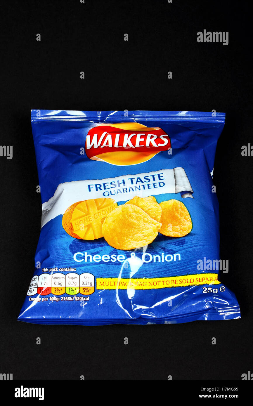 Walkers cheese and onion flavour crisps isolated on a black background  Stock Photo - Alamy