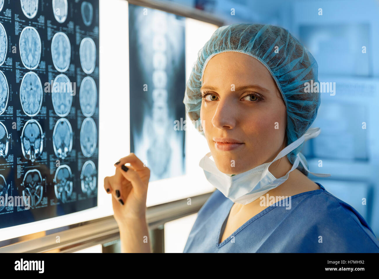 Surgeon examining Xray Stock Photo